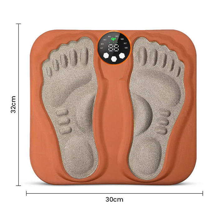 Orange TENS-fodmassagemåtte med fodaftryk, digitalt display, måler 32 x 30 cm og leveres med trådløs fjernbetjening.