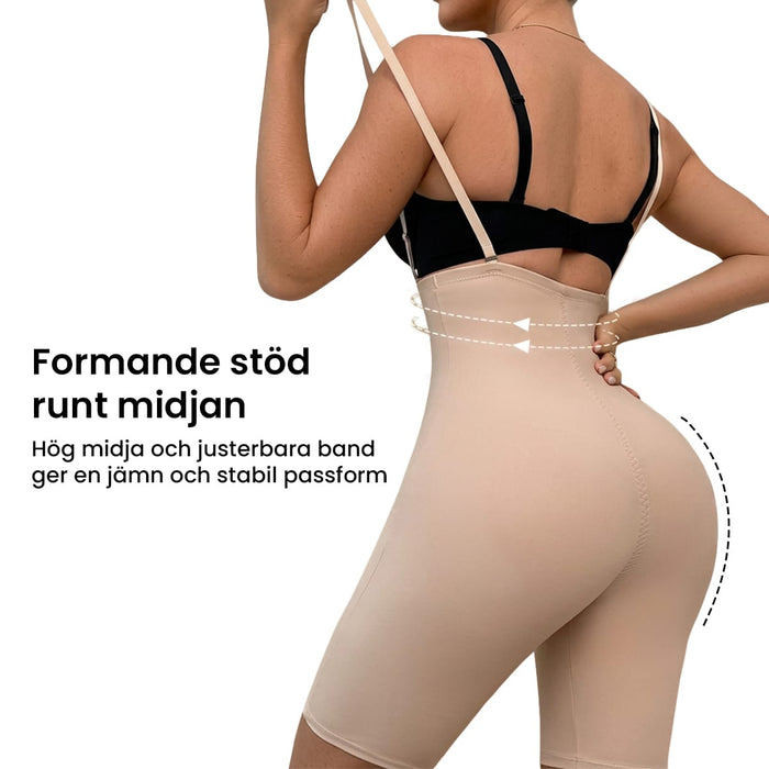 En kvinde iført formende shorts med seler og sort BH; en svensk tekst i taljen beskriver støtte og pasform.